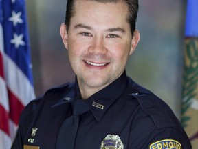 This undated photo provided by Edmond Police Department shows Edmond, Okla., police Sgt. C.J. Nelson. Nelson, 38, died Tuesday, July 20, 2022 after being struck by a pickup truck just outside the Edmond city limits in Oklahoma City, according to Edmond police.(Edmond Police Department via AP)