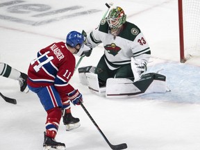 Montreal Canadiens' Brendan Gallagher (11) is stopped by Minnesota Wild goaltender Cam Talbot (33) during second period NHL hockey action in Montreal, Tuesday, April 19, 2022. Talbot is not sure what his first season in Ottawa will bring, but believes he still has a lot to offer the Senators as they look to become a playoff contender.THE CANADIAN PRESS/Ryan Remiorz
