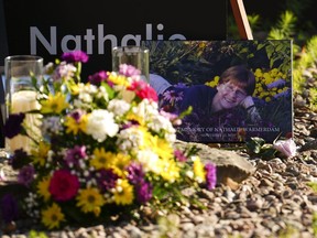 A picture of murder victim Nathalie Warmerdam, is displayed during a vigil at the Women's Monument in Petawawa, Ont., following the juries release of recommendations in the Borutski Inquest in Pembroke, Ont., on Tuesday, June 28, 2022.A police board in southern Ontario is gathering input from the public as it prepares to ask the federal government to add the term femicide to the Criminal Code of Canada, which some advocates say is necessary to address a national crisis.THE CANADIAN PRESS/Sean Kilpatrick