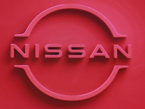 The Nissan Motor Co. logo is displayed at the company's global headquarters in Yokohama near Tokyo, on Aug. 18, 2021. Japanese automaker Nissan's profit plunged in the last quarter to half of what it was a year ago as the COVID-19 lockdown in China and a global semiconductor shortage slammed production. Nissan Motor Co. reported Thursday, July 28, 2022, that its April-June net profit totaled 47.1 billion yen ($349 million), down from 114.5 billion yen in the same period of 2021.
