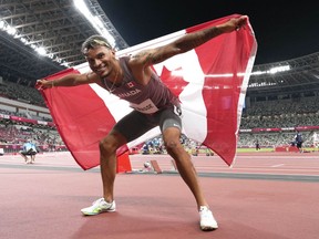 Andre De Grasse of Canada reacts after winning the bronze medal in the Men's 100m final during the summer Tokyo Olympics in Tokyo, Japan on Sunday, August 1, 2021. Despite De Grasse's sizzling anchor leg that secured Canada a thrilling world relay victory, the sprint star still isn't feeling back at full health.THE CANADIAN PRESS/Frank Gunn