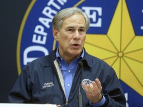 FILE - Texas Gov. Greg Abbott speaks during a news conference on March 10, 2022, in Weslaco, Texas. The U.S. Department of Justice is investigating potential civil rights violations in Texas' multibillion-dollar border security mission that has given the National Guard arrest powers and seen state authorities bus migrants to Washington, D.C., according to public records.