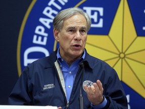 FILE - Texas Gov. Greg Abbott speaks during a news conference on March 10, 2022, in Weslaco, Texas. Abbott has said that he stopped at a campaign fundraiser following the deadly school shooting in Uvalde and "let people know" he couldn't stay, but a newspaper reports that he was there for nearly three hours.