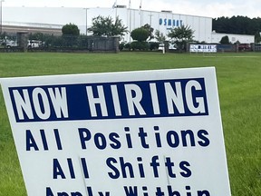 A sign advertising jobs stands near the SMART Alabama, LLC auto parts plant and Hyundai Motor Co. subsidiary, in Luverne, Alabama U.S. July 14, 2022.