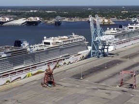 FILE - In this May 4, 2020, photo, Norwegian cruise ships are docked at Portsmouth Marine Terminal in Portsmouth, Va. The Norwegian Cruise Line company is dropping a requirement that passengers test negative for COVID-19 before sailing. The company said Wednesday, July 6, 2022, that testing will only be needed on ships departing from places where local rules still requires testing, including in the United States and Canada. The change starts Aug. 1.