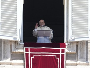 Pope Francis delivers the Angelus noon prayer from his studio window overlooking St. Peter's Square at the Vatican, Sunday, July, 10, 2022.