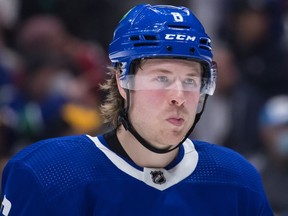 Vancouver Canucks' Brock Boeser lines up for a faceoff against the Montreal Canadiens during the third period of an NHL hockey game in Vancouver, on Wednesday, March 9, 2022.&ampnbsp;The team announced Friday that the 25-year-old right-winger has agreed to a new three-year contract worth US$6.65 million per year.
