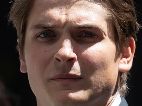 Former Vancouver Canucks NHL hockey player Jake Virtanen leaves B.C. Supreme Court during a lunch break after closing arguments in his sexual assault trial, in Vancouver, on Monday, July 25, 2022. A jury has found Virtanen not guilty of sexual assault.