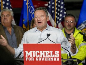 FILE -- Tim Michels says a few words about initiatives he would support during the launching of his gubernatorial campaign on April 25, 2022, in Brownsville, Wis. Michels said, Tuesday, July 13, 2022, that he won't rule out attempting to decertify President Joe Biden's 2020 win in the state.