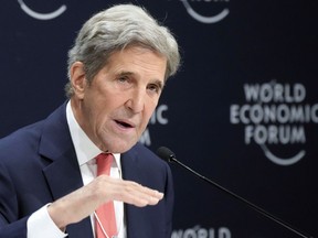 FILE - John F. Kerry, Special Presidential Envoy for Climate of the United States, gestures during a news conference at the World Economic Forum in Davos, Switzerland, May 24, 2022. Kerry said Friday, July 1, that setbacks for President Joe Biden's climate efforts at home have "slowed the pace" of some of the commitments from other countries to cut climate-wrecking fossil fuels, but he insisted the U.S. would still achieve its own ambitious national climate goals in time.