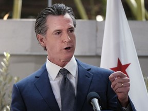 FILE - California Governor Gavin Newsom answers questions at a news conference in Los Angeles, on June 9, 2022. As President Joe Biden runs up against the limits of what he can do on abortion, gun control and other issues without larger Democratic majorities in Congress, some in his party want more fire and boldness than the president's acknowledgement of their frustration and calls imploring people to vote in November.