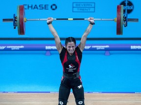 Canada's Hannah Kaminski, from Calgary, lifts her way to a bronze medal in the women's 49 kg weightlifting event at the Commonwealth Games in Birmingham, England on Saturday, July 30, 2022.