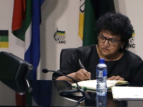 FILE - Deputy General Secretary of the African National Congress (ANC) Jesse Duarte sits at the ANC headquarters in downtown Johannesburg, Tuesday, Feb. 13, 2018. South African President Cyril Ramaphosa has paid tribute to Duarte, who died Sunday, July 17, 2022, after a long battle with cancer.