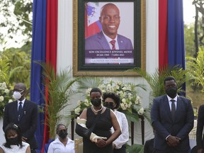 FILE - First Lady Martine Moise, center, attends a memorial service for her late husband President Jovenel Moise, at the National Pantheon Museum, in Port-au-Prince Haiti, July 21, 2021. Rodolphe Jaar, a businessman with dual Haitian and Chilean nationality pleaded not guilty Wednesday, July 6, 2022, to two criminal charges for the 2021 assassination of Moise.