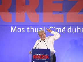 Former Albanian Prime Minister and Democratic Party leader Sali Berisha speaks during an anti-government rally in Tirana, Albania, on Thursday, July 7, 2022. The Albanian opposition rallied Thursday in the capital Tirana calling for the resignation of the government which they blame for corruption and inflicting poverty.