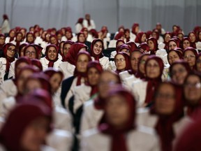 Members of the Ashraf-3 camp attend the speech of former U.S. Vice President Mike Pence at the Iranian opposition headquarters in Albania, where up to 3,000 MEK members reside at Ashraf-3 camp in Manza town, about 30 kilometers (16 miles) west of Tirana, Albania, Thursday, June 23, 2022.