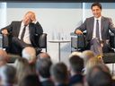 Canadian Prime Minister Justin Trudeau (right) and Chancellor of Germany, Olaf Scholz attend a discussion at an event hosted by the Canadian-German Chamber of Industry and Commerce. in Toronto on Tuesday, August 23, 2022. THE CANADIAN PRESS/Chris Young