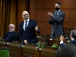 In this 2020 photo, Minister of Justice David Lametti gives a thumbs up as he rises to vote in favour of a motion on Bill C-7, which dramatically liberalized euthanasia access in Canada.
