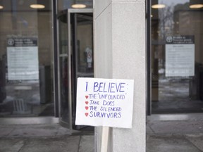 Statistics Canada says the rate of police-reported sexual assault in Canada has reached the highest level since 1996. A placard is left outside court in this Tuesday, March 14, 2017 file photo.