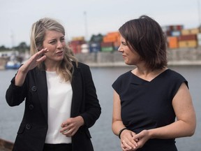 Canadian Foreign Minister Mélanie Joly (L) and her German counterpart Annalena Baerbock (R) visit Port of Montreal's Viterra grain terminal in Montreal, Quebec, Canada, on August 3, 2022.