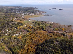 An aerial view of Fort Chipewyan, Alta., on the border of Wood Buffalo National Park is shown on Monday, Sept. 19, 2011. A United Nations body that monitors some of the world's greatest natural glories is in Canada again to assess government responses to ongoing threats to the country's largest national park, including plans to release treated oilsands tailings into its watershed.