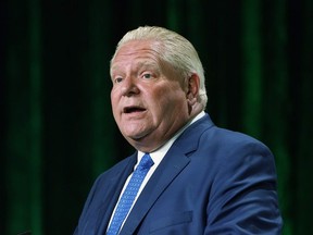 Ontario Premier Doug Ford speaks to the Association of Municipalities Ontario conference on August 15, 2022 in Ottawa. The association says the province must conduct broad consultations as it considers expanding so-called "strong mayor" powers to communities other than Toronto and Ottawa.