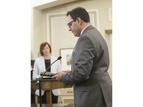 Demetrios Nicolaides, Minister of Advanced Education is sworn into office, in Edmonton on Tuesday April 30, 2019. The president of Alberta's online Athabasca University says the province's demand that the school relocate 500 staffers to the tiny rural town is so self-defeatingly backward it threatens to put the institution "on the path to ruin."