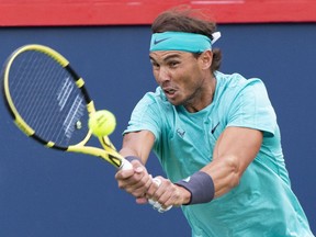 The National Bank Open lost one its star attractions on Friday after five-time champion Rafael Nadal announced his withdrawal from the tournament. Nadal of Spain returns to Fabio Focnini of Italy during quarter-final play at the Rogers Cup tennis tournament Friday August 9, 2019 in Montreal.