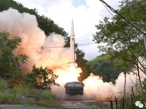 The Rocket Force under the Eastern Theatre Command of China's People's Liberation Army (PLA) conducts conventional missile tests into the waters off the eastern coast of Taiwan, from an undisclosed location in this handout released on August 4, 2022.