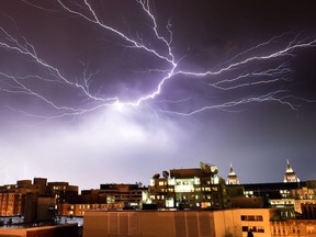 Lightning brightens the night sky over Washington, DC, during a rainstorm on April 20, 2015.