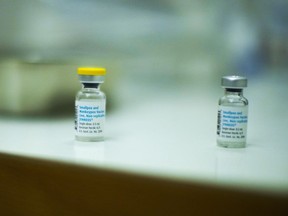 Empty vials of vaccines against monkeypox lie on a table after being used to vaccinate people at a medical centre in Barcelona, Spain, Tuesday, July 26, 2022.