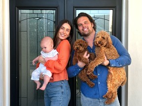 Astrid Loch, Kevin Wendt and their son and pups.