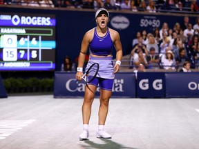 Canadian Bianca Andreescu celebrates winning a point against Daria Kasatkina of Russia during the National Bank Open in Toronto on August 9, 2022.