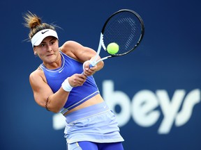 Canadian Bianca Andreescu hits a shot against Daria Kasatkina of Russia during the National Bank Open in Toronto on August 9, 2022.