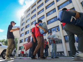 Students with the help of family and student volunteers move into residence buildings at the University of Calgary on move in day, Sunday, August 28, 2022.
Gavin Young/Postmedia