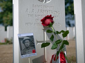 A rose sits on the grave of a soldier at the Dieppe Canadian War Cemetery, during the commemoration of the 80th anniversary of Operation Jubilee in Hautot-sur-Mer, Northwestern France.  On Aug. 19, 1942, 6,000 Allied soldiers, including a majority of Canadians, sailed from the English coast toward what was to be a carnage: more than 1,000 dead, including 907 Canadians on the same day, three times more than for the D-Day invasion.