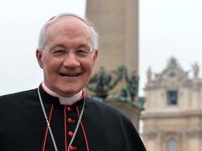 Canadian cardinal  Marc Ouellet walks on St Peter's square after a meeting on the second day of pre-conclave on March 5, 2013 at the Vatican.