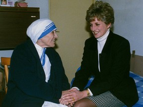 Mother Teresa of Calcutta and Diana, Princess of Wales, hold hands during their first meeting, in Rome on Feb. 19, 1992. The two died five days apart five years later — Diana on Aug. 31, 1997, and Mother Teresa on Sept. 5, 1997.