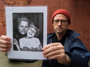 Vancouver man Ray Chwartkowski holds up a picture of his sister Cheryl (seen as a child in the picture with her mother, Rose). Cheryl received medical assistance in dying in 2019 at age 50 and Chwartkowski believes his sister (who suffered from lifelong mental health issues) should not have been eligible as she did not have a terminal illness.
