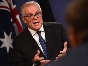 Australia's former prime minister, Scott Morrison, speaks to the media on Aug. 17, 2022. It has been revealed that Morrison secretly became co-minister of five cabinet posts while PM.