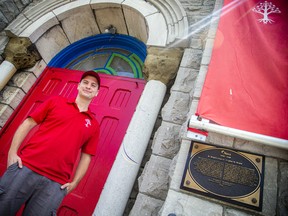 William Komer, a director with The United People of Canada, stands outside the former Ottawa church that the group now refers to as an embassy.