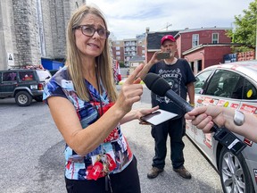 The United People of Canada (TUPOC) spokesperson Diane Nolan speaks outside of the former church the group calls an embassy on August 18, 2022.