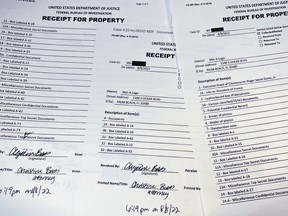 The three page itemized list of property seized in the execution of a search warrant by the FBI at former President Donald Trump's Mar-a-Lago estate is seen after being released by the U.S. District Court for the Southern District of Florida in West Palm Beach, Florida, August 12, 2022.