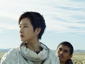 Xingchen Lyu and Jorge Antonio Guerrero in We Are Living Things.