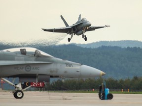 A Canadian Forces CF-18 Hornet comes in for a landing at CFB Bagotville, Quebec in 2018.