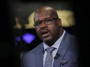 Former basketball star Shaquille O'Neal, speaks during an interview on CNBC about joining the board of Papa John?s International Inc., on the floor of the New York Stock Exchange (NYSE) in New York, U.S., March 22.
