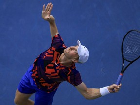 Denis Shapovalov, of Canada, serves to Daniil Medvedev, of Russia, during the Western. Southern Open tennis tournament, Thursday, Aug. 18, 2022, in Mason, Ohio.