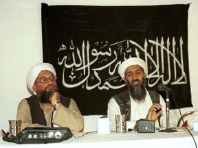 In this 1998 photo made available Friday, March 19, 2004, Ayman al-Zawahri, left, listens during a news conference with Osama bin Laden in Khost, Afghanistan. A U.S. airstrike has killed al-Qaida leader Ayman al-Zawahri in Afghanistan, according to a person familiar with the matter.