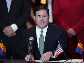 FILE - Arizona Republican Gov. Doug Ducey speaks during a bill signing in Phoenix, Arizona, April 15, 2021,. Ducey is to arrive in Taiwan on Tuesday for a visit focused on semiconductors, the critical chips used in everyday electronics that the island manufactures.