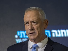 FILE - Benny Gantz speaks at the announcement of former IDF chief Gadi Eisenkot's election bid in Ramat Gan, Israel, Sunday, Aug. 14, 2022. Gantz said Friday, Aug. 26, it was important to maintain capabilities for "defensive and offensive purposes" as he met with a senior U.S. official to reiterate Israel's opposition to an emerging nuclear deal with Iran.